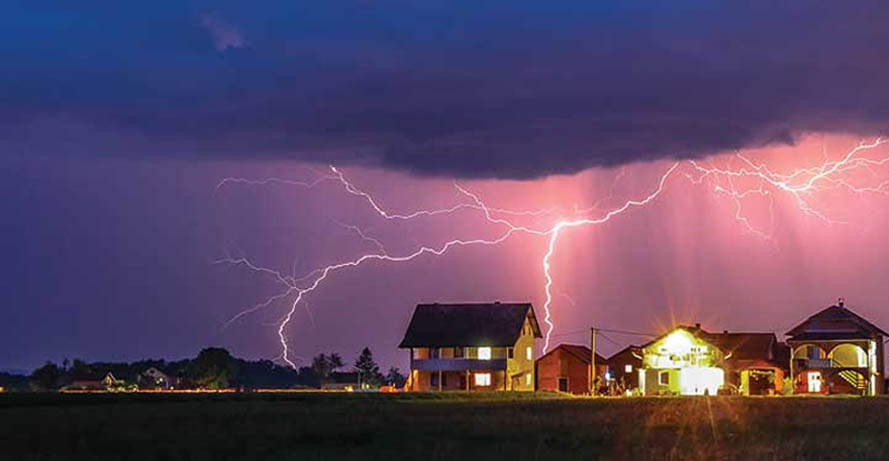 A thunderstorm with streaks of lightning.